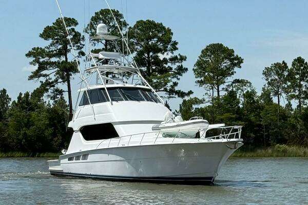 Picture Of: 2002 Hatteras 65 Enclosed Bridge MoonTan