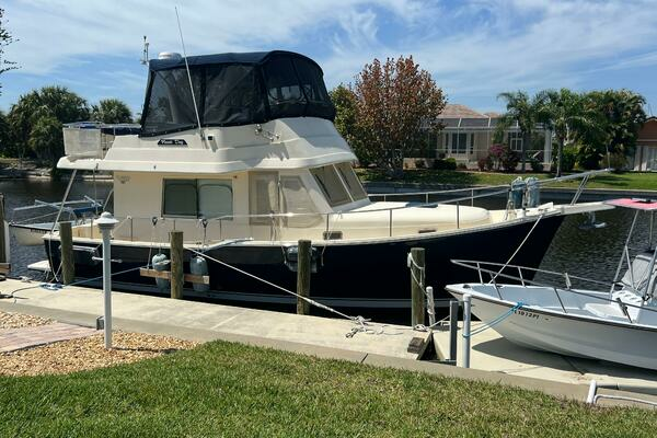 Picture Of: 2005 Mainship 34 NAUTI DOG