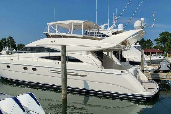 Picture Of: 2006 Viking Sport Cruisers 61 Flybridge Off the Road