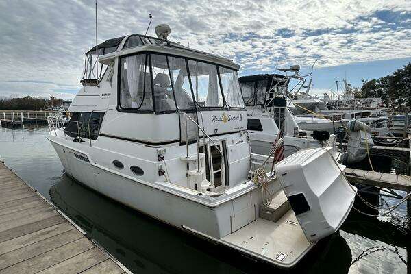 Picture Of: 1999 Carver 40 Cockpit Nauti Savages II