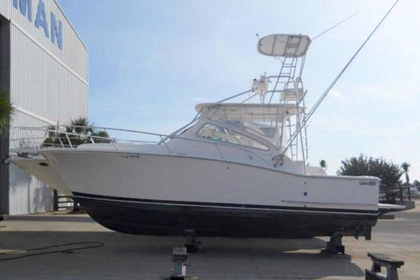 information on Luhrs 30 Open, Sharky photo of 31' Luhrs 30 Open 2004